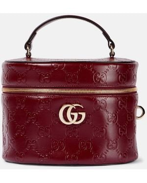Gucci Gg Embossed Leather Vanity Bag - Red