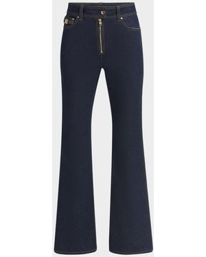 デニム・ジーパン AMIRI Woman Jeans Blue DNGG1006 INDIGO AMIRI Straight jeans with rips Antique Indigo | TheDoubleF