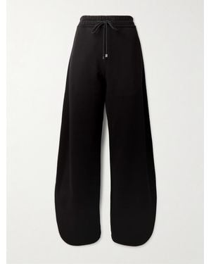 Alaïa Petal Cotton-Jersey Barrel-Leg Track Trousers - Black