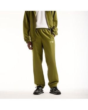 New Balance Trackside Woven Pant - Green