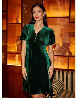 Yumi' Velvet Skater Dress With Dimante Bow Detail - Orange