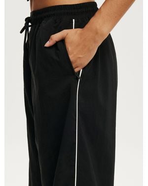 Cotton On Mid Rise Baggy Woven Sweatpants With Pipping Side Detailing - Black