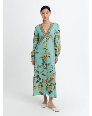 Raishma Elsa Is A Sophisticated Midi Dress Featuring A Deep V-Neckline Long Statement Sleeves And A Flowing Silhouette - Green