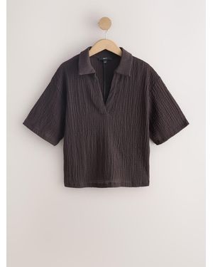 Next Short Sleeved Textured Boxy Polo Top - Black