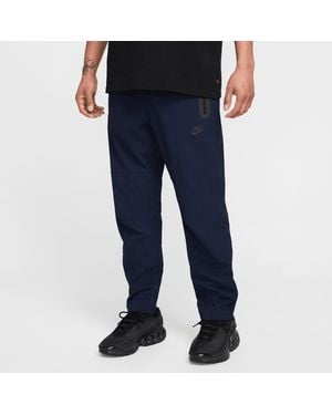 Nike Tech Woven Open-Hem Trousers - Blue