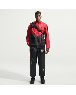 Nike Windrunner Storm-Fit Graphic Pants - Red