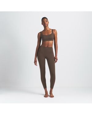Nike Skims Matte High-Waisted V-Line 26" Leggings - Brown