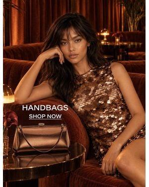 Nina Handbags Collection Ad - Blue