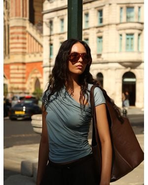 NINETY PERCENT Scarab Micromodal Cut Out Top In Powder Blue - Metallic