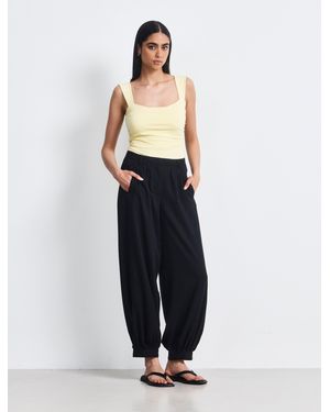 NINETY PERCENT Lumi Smart Trouser In Black - Blue