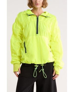Free People Fp Movement Fp Light Packer Water Resistant Hiking Pullover - Yellow