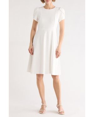 green emerald velvet dress Calvin Klein Women's Tulip Short Sleeve Scuba Crepe Mini Dress, Indigo  Multi, 2 at Amazon Women's Clothing store