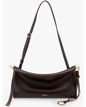 Alaïa Le Click East West Small Leather Crossbody Bag - Black