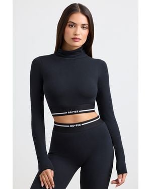 BO+TEE Backless Turtleneck Long-Sleeve Crop Top - Black