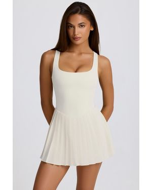 BO+TEE Soft Active Open-Back Pleated Tennis Dress - White