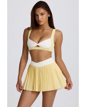 BO+TEE Soft Active Crossover Pleated Mini Skort - Yellow