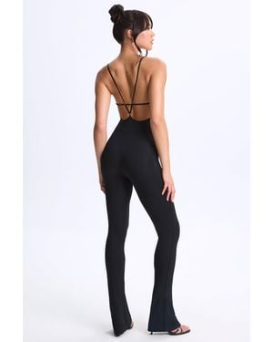 Oh Polly Modal Plunge Open-Back Flared Jumpsuit - Black