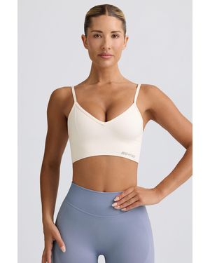 BO+TEE Define Luxe V-Neck Sports Bra - White