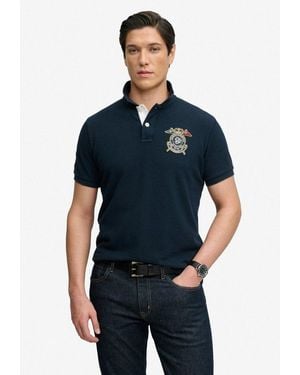 Superdry Poloshirt Crest Polo Mit Markenlabel, Aus Baumwolle, Relaxed Fit, Bedruckte Optik - Blau