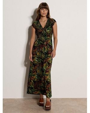 Apricot Maxikleid Smockkleid Mit Tropischem Blattmuster - Schwarz