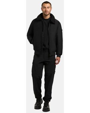 Khujo Outdoorjacke Ginster Herren Winterjacke Mit Teddyfleece-Besatz Und Magnetischen Details - Schwarz