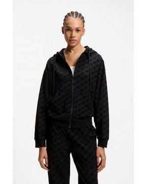HUGO Kapuzensweatjacke Flokky Flock-Logo-Print, Relaxed Fit - Schwarz