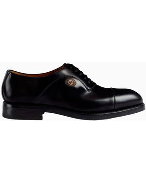Gucci Zapatos oxford con motivo Interlocking G - Negro