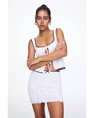 Pull&Bear Lace Mini Skirt With Lace Trim And Bow - White