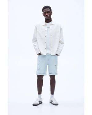 Pull&Bear Slim-Fit Jeans-Bermudashorts Mit Rissen - Blau