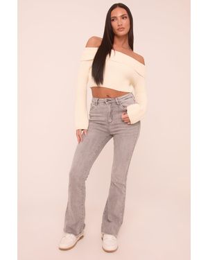 Rebellious Fashion Light High Waist Kick Flare Frayed Hem Denim Jeans - Natural