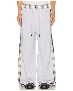 Feng Chen Wang Patched Panel Jersey Trousers - White