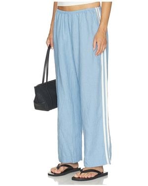 DONNI. The Linen Crop Racer Stripe Pant - Blue
