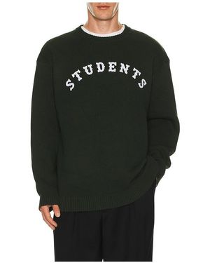 Students Golf PULL en Dark Green - Noir
