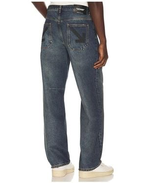 Off-White c/o Virgil Abloh Half Arrow Relaxed Tapered Jeans - Blue