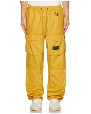 BBCICECREAM Hemisphere Cargo Trousers - Yellow