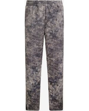 Roberto Cavalli Faded Effect Trousers With All-Over Lettering - Grey