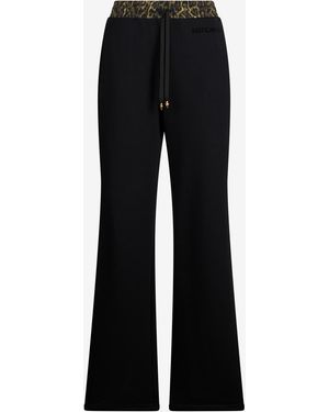 Roberto Cavalli Flared Pants With Leopard Print Waistband - Black