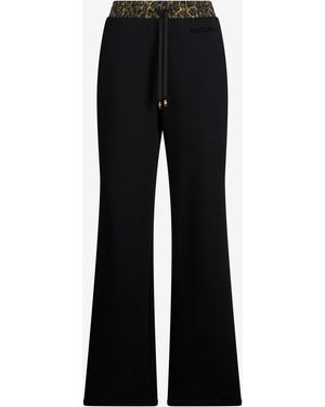 Roberto Cavalli Flared Trousers With Leopard Print Waistband - Black