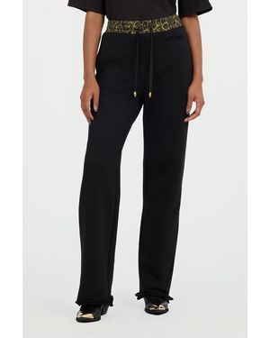 Roberto Cavalli Flared Trousers With Leopard Print Waistband - Black