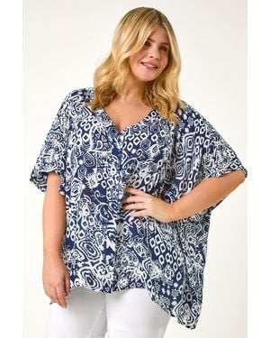Roman Curve Ikat Print Asymmetric Blouse - Blue