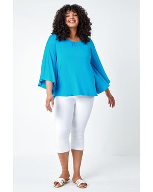 Roman Curve Stretch Jersey Cape Sleeve Top - Blue