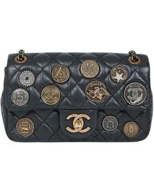 CHANEL Black Aged Calfskin Coin Medallion Mini Flap Bag