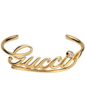 Gucci Cuff Bracelet With Logo Script - Metallic