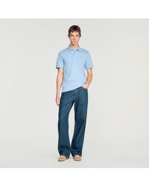 Sandro Cotton Polo Shirt With Leather Logo - Blue