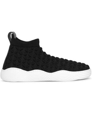 Alaïa Woven Petal Stretch Trainers - Black