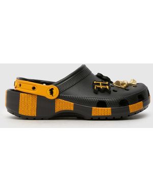 Crocs™ Hufflepuff Classic Clog Sandals In - Brown