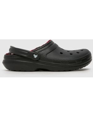 Crocs™ Classic Lined Clog Sandals In - Black