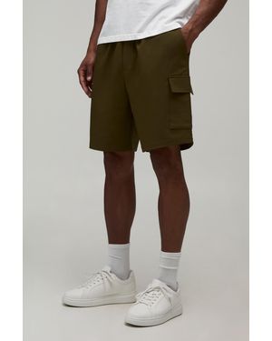 BoohooMAN Relaxed Fit Elasticated Technical Stretch Cargo Shorts - Green