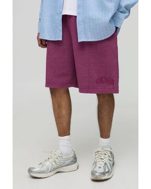 BoohooMAN Baggy Fit Washed Worldwide Embroidered Short - Pink