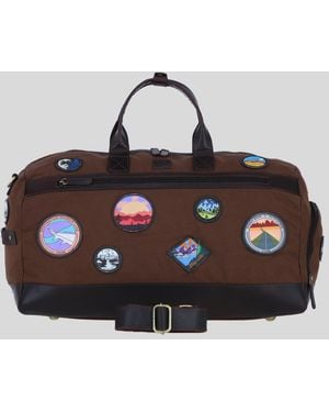 Fenland Sheepskin Heritage Canvas Travel Holdall With Adventure Patches - Brown